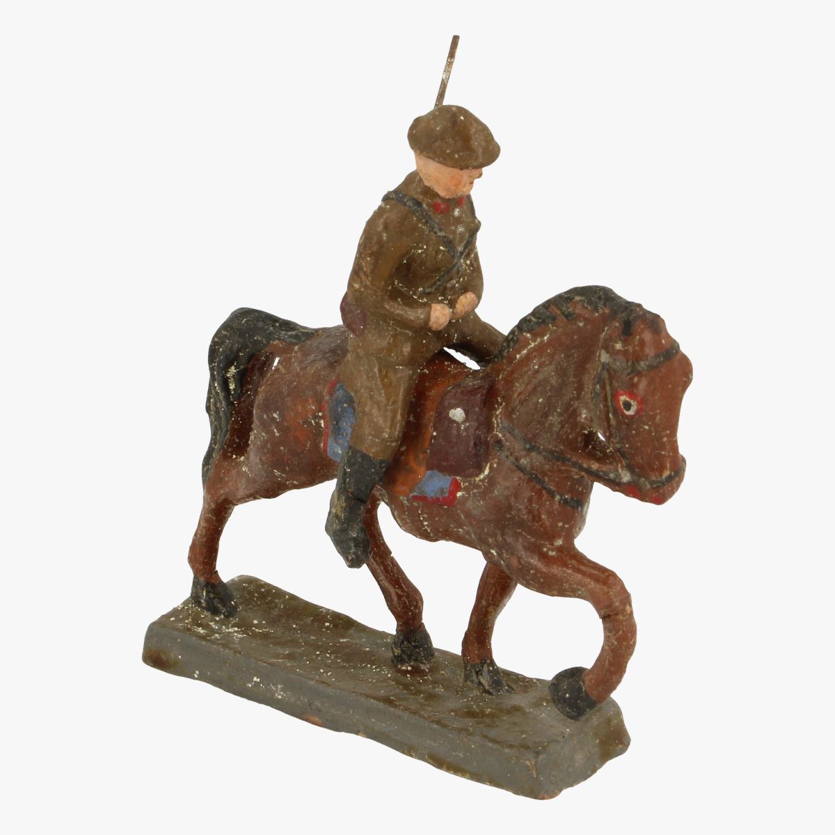 Afbeeldingen van elastolin soldaatje met paard 
